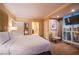 Relaxing bedroom offers a king bed, city views, and elegant decor at 125 E Harmon Ave # 2801&2803, Las Vegas, NV 89109