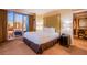 Comfortable bedroom features a plush king-sized bed, soft lighting, and floor-to-ceiling windows at 125 E Harmon Ave # 2801&2803, Las Vegas, NV 89109