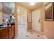 Hallway with drink counter leading to bathroom with soaking tub at 125 E Harmon Ave # 2801&2803, Las Vegas, NV 89109