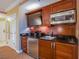 Hotel kitchenette with stainless steel appliances and ample counter space at 125 E Harmon Ave # 2801&2803, Las Vegas, NV 89109