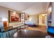 Spacious hotel suite featuring a bedroom, living area, and a well-equipped kitchenette at 125 E Harmon Ave # 2801&2803, Las Vegas, NV 89109