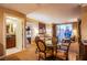 Well-appointed living area with a dining table, sofa, and views of the city skyline at 125 E Harmon Ave # 2801&2803, Las Vegas, NV 89109