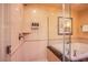Modern shower with glass enclosure, tiled walls, and sleek fixtures for a refreshing experience at 125 E Harmon Ave # 2801&2803, Las Vegas, NV 89109