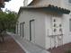 Exterior view of building with private entrances and manicured landscape at 1341 Cinder Rock Dr # 101, Las Vegas, NV 89128