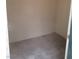Neutral-colored storage room, featuring concrete floors and a white door at 1341 Cinder Rock Dr # 101, Las Vegas, NV 89128
