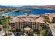 Beautiful lakefront condos with tile roofs, palm trees, and stunning mountain and water views at 15 Via Mantova # 308, Henderson, NV 89011