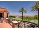 Balcony with golf course views, palm trees, and mountain scenery at 15 Via Mantova # 308, Henderson, NV 89011