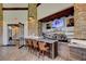 Clubhouse bar featuring stone accents, TV, and seating at 15 Via Mantova # 308, Henderson, NV 89011