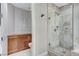 Bathroom featuring a glass shower and private toilet area at 15 Via Mantova # 308, Henderson, NV 89011