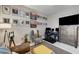 Comfortable bedroom with work space, warm color palette, television and an abundance of natural light at 15 Via Mantova # 308, Henderson, NV 89011