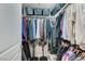 Walk-in closet with ample storage and clothing racks at 15 Via Mantova # 308, Henderson, NV 89011