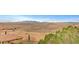 Scenic view of desert landscape with mountain backdrop, showcasing the natural beauty surrounding the home at 15 Via Mantova # 308, Henderson, NV 89011