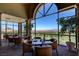 Bright dining area with scenic golf course and lake views at 15 Via Mantova # 308, Henderson, NV 89011