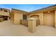 Inviting exterior with stucco finish, tile roofing, and wrought iron details on a sunny day at 15 Via Mantova # 308, Henderson, NV 89011