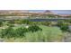 Expansive golf course with scenic views of the lake and surrounding mountains at 15 Via Mantova # 308, Henderson, NV 89011