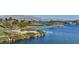 Tranquil lake view featuring a small island and picturesque landscaping at 15 Via Mantova # 308, Henderson, NV 89011