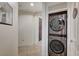 Hallway with an in-unit stacked washer and dryer set at 15 Via Mantova # 308, Henderson, NV 89011