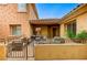 Inviting patio with wrought iron accents, offering a cozy space for outdoor enjoyment and relaxation at 15 Via Mantova # 308, Henderson, NV 89011