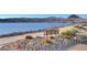 Scenic walking path with bench seating overlooks the beautiful lake and mountain views at 15 Via Mantova # 308, Henderson, NV 89011