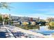 Waterfront view of Lake Las Vegas featuring waterfront buildings and bridges reflecting on the water's surface at 15 Via Mantova # 308, Henderson, NV 89011