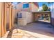 Private backyard patio with sheltered parking, storage shed, and sun shades to stay cool and enjoy the outdoors at 1601 Becke Cir, Las Vegas, NV 89104