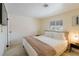 Bedroom features a king bed, neutral walls, bedside tables and lamps, plus carpeted floors at 1601 Becke Cir, Las Vegas, NV 89104