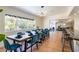 Spacious dining room with a large table, ample seating, and a view into the living spaces at 1601 Becke Cir, Las Vegas, NV 89104