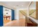 Hallway view of open blue sliding doors leading into a bedroom with a pool table at 1601 Becke Cir, Las Vegas, NV 89104