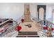The grand foyer features a sweeping staircase with elegant railings and tile flooring, and a soaring ceiling at 2339 Prometheus Ct, Henderson, NV 89074
