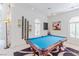 Bright game room with a well-maintained pool table, neutral walls, and art at 2339 Prometheus Ct, Henderson, NV 89074