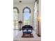 Piano room with large windows offering scenic views and bright decor at 2339 Prometheus Ct, Henderson, NV 89074