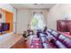 The sitting area features lots of natural light, a sofa, and a recliner at 2339 Prometheus Ct, Henderson, NV 89074