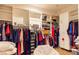 Spacious walk-in closet featuring ample storage and built-in shelving units at 2339 Prometheus Ct, Henderson, NV 89074