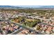High-angle aerial view of a well-planned residential area with diverse trees and scenic landscapes at 2547 Wolverton Ave, Henderson, NV 89074
