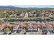 Wide aerial shot of a neighborhood filled with charming homes, showcasing the community's landscape at 2547 Wolverton Ave, Henderson, NV 89074