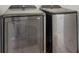 Modern stainless-steel Samsung washer and dryer set in laundry room at 2547 Wolverton Ave, Henderson, NV 89074
