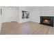 Bright living room featuring a fireplace, neutral walls, and modern flooring, creating a welcoming space at 2547 Wolverton Ave, Henderson, NV 89074