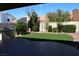 Private backyard with artificial turf and BBQ perfect for outdoor entertaining and relaxation at 2744 Pala Dura Dr, Henderson, NV 89074