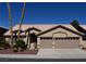 Charming single-story home with well-maintained desert landscaping and a two-car garage at 2744 Pala Dura Dr, Henderson, NV 89074
