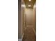 Bright hallway featuring tile flooring and neutral paint, leading to other areas of the home at 2744 Pala Dura Dr, Henderson, NV 89074