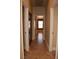 Hallway with tile flooring and views into other rooms at 2744 Pala Dura Dr, Henderson, NV 89074