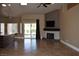 Cozy living room featuring a modern fireplace with a mounted television at 2744 Pala Dura Dr, Henderson, NV 89074