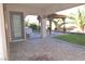This back patio has pavers, a barbecue and beautiful landscaping at 2822 Poseidon Shore Ave, Henderson, NV 89052