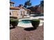 Inviting community hot tub area surrounded by well maintained landscaping and clubhouse at 2967 Juniper Hills Blvd # 104, Las Vegas, NV 89142