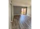 Living room featuring gray flooring and sliding glass door to the patio at 2967 Juniper Hills Blvd # 104, Las Vegas, NV 89142