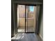 Outdoor patio accessible via sliding glass doors with a fenced-in surround at 2967 Juniper Hills Blvd # 104, Las Vegas, NV 89142
