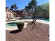 Inviting community pool and hot tub area surrounded by well maintained landscaping at 2967 Juniper Hills Blvd # 104, Las Vegas, NV 89142