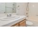 Bathroom featuring tile flooring, shower-tub combo, and vanity with updated faucet at 3673 Ian Thomas St # 201, Las Vegas, NV 89129