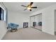 Bedroom with mirrored closet doors, ceiling fan and blue decor at 3681 S Rosecrest Cir, Las Vegas, NV 89121