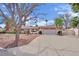 Charming single-story home with a well-manicured front yard, complemented by a wide driveway at 3681 S Rosecrest Cir, Las Vegas, NV 89121